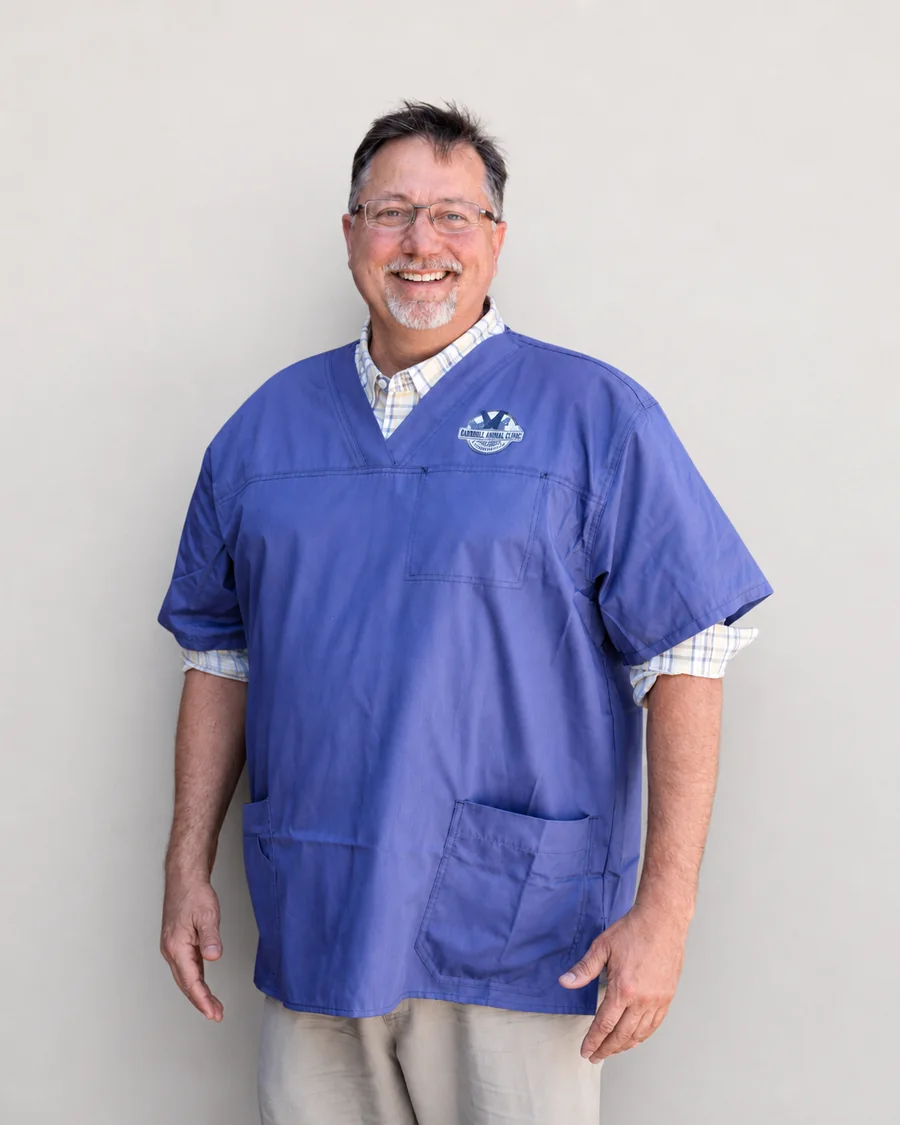 Dr. Scott Kuecker, Staff Veterinarian, in his Marshall Animal Clinic scrub top